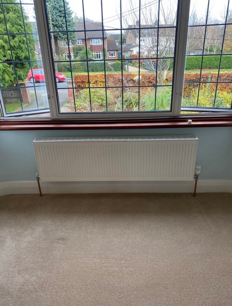 Bedroom radiator relocated beneath the window in Princes Risborough