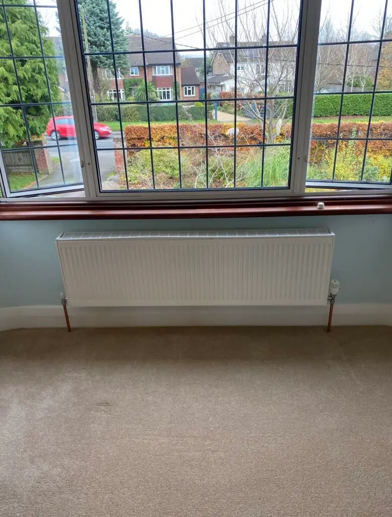 Bedroom radiator relocated beneath the window in Princes Risborough